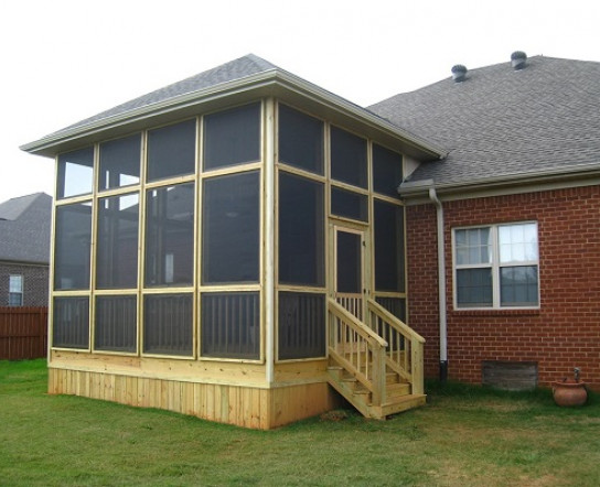 A bran new screened-in porch addition A bran new screened-in porch addition