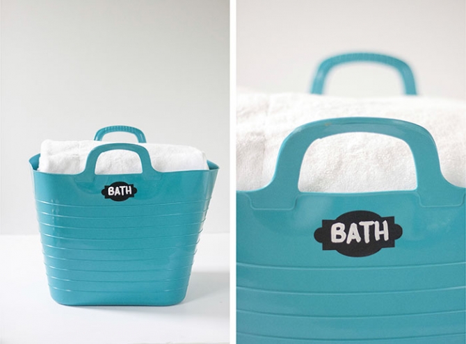 organized bath towels in buckets