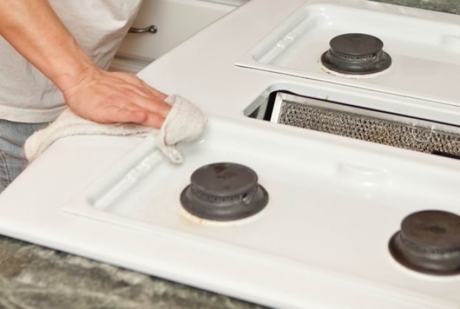 A regular cleaning solution works well to clean a stovetop. (Photo by Brandon Smith)