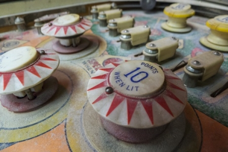 Pinball machine repair involves attention to many small details. (Photo by Jay Madden)