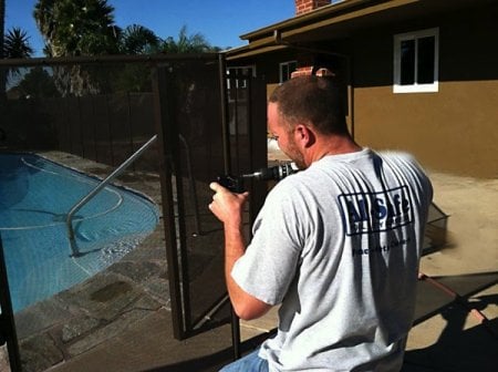 Fencing around your pool is an essential part of childproofing your home. (Photo courtesy of Angie's List member Donald L.)