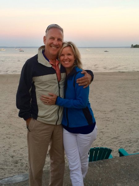 Ken and Mary Jezioro standing on the beach
