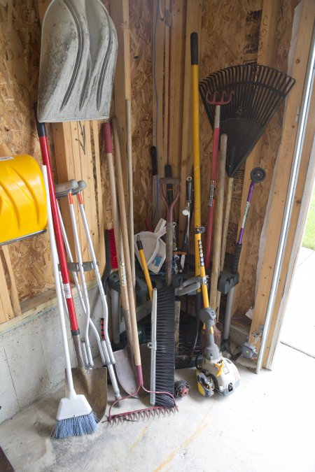 garage tools, rakes and shovels (Photo by Eldon Lindsay)