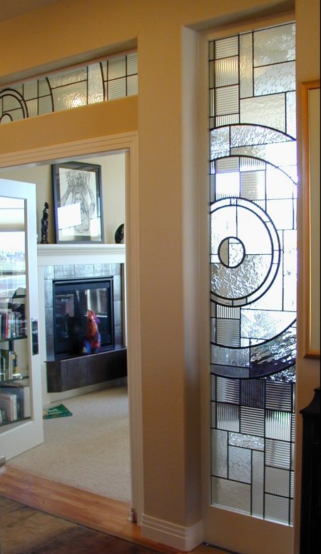 doorway with leaded glass above and beside