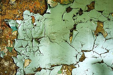 If you notice paint peeling on the interior or exterior of your house near the roof, it may be a sign that your roof has been compromised and needs to be replaced, says Lindus. (Photo courtesy of Lindus Construction)