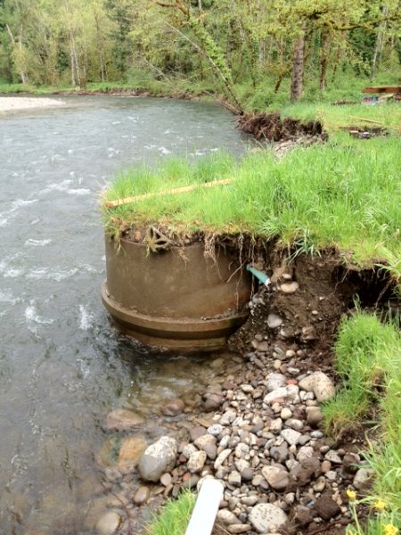 exposed septic tank in creek