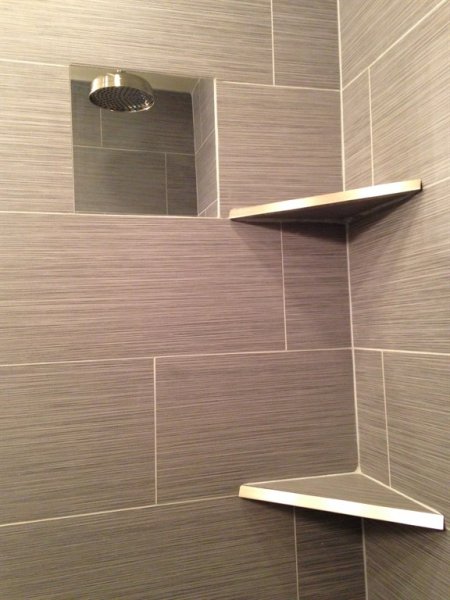 shower with wall niche and shelves