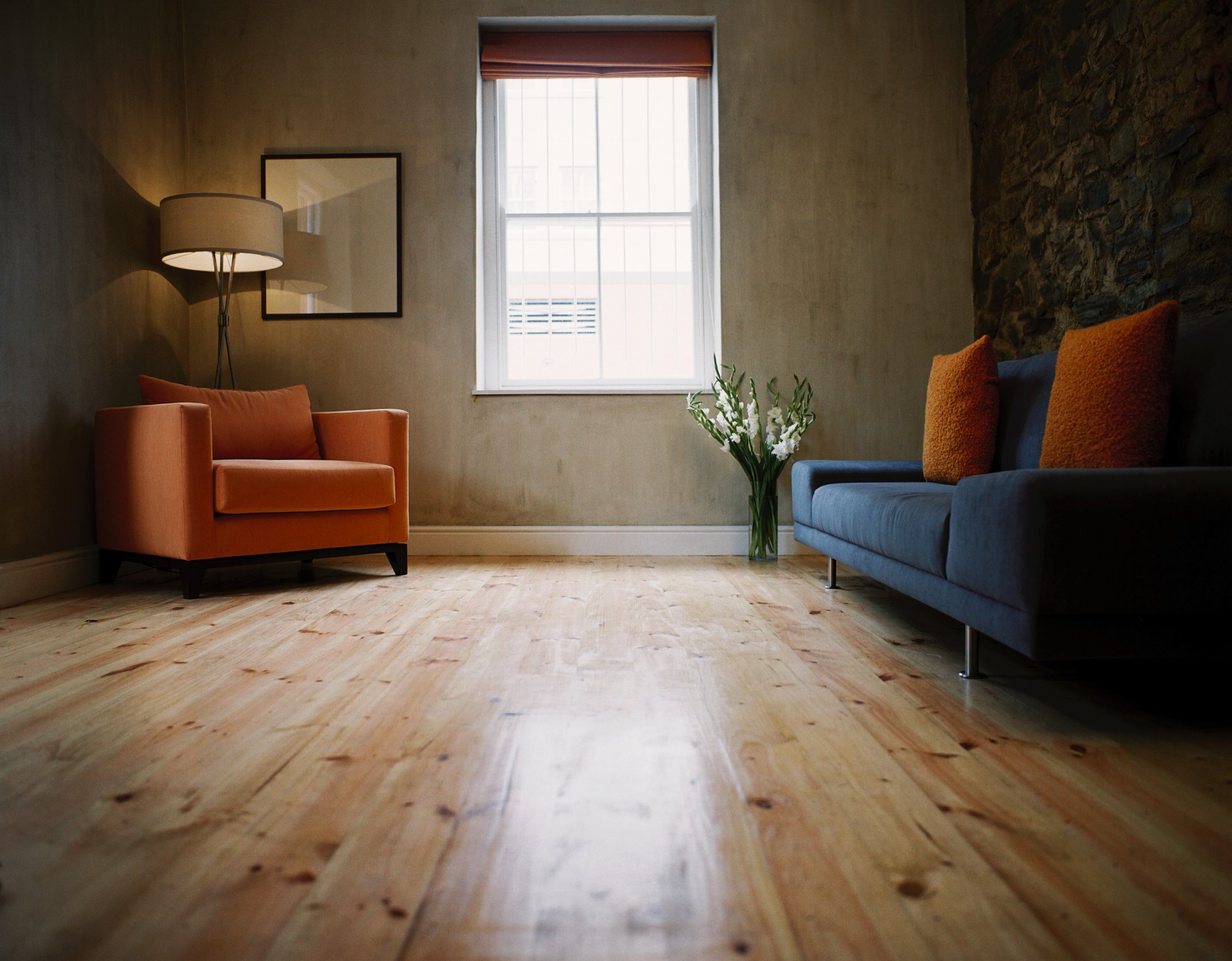 Living Room Lighting Ideas A small living room with a floor lamp in the corner