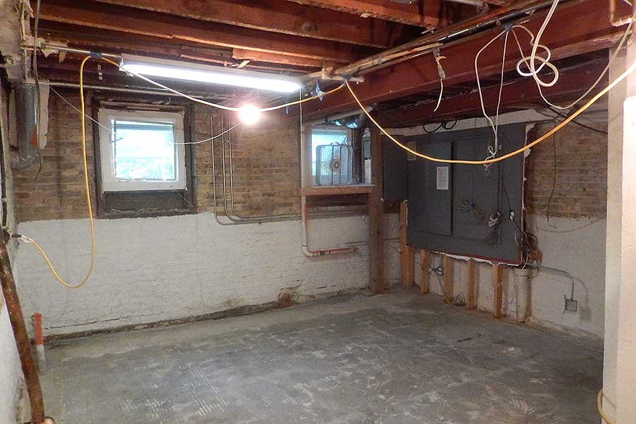 unfinished basement before remodel