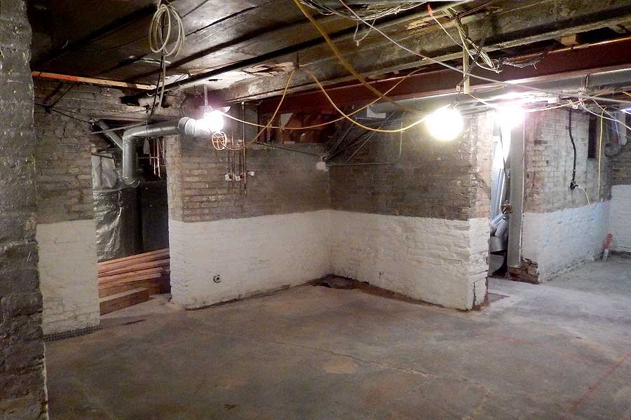 unfinished basement before remodel