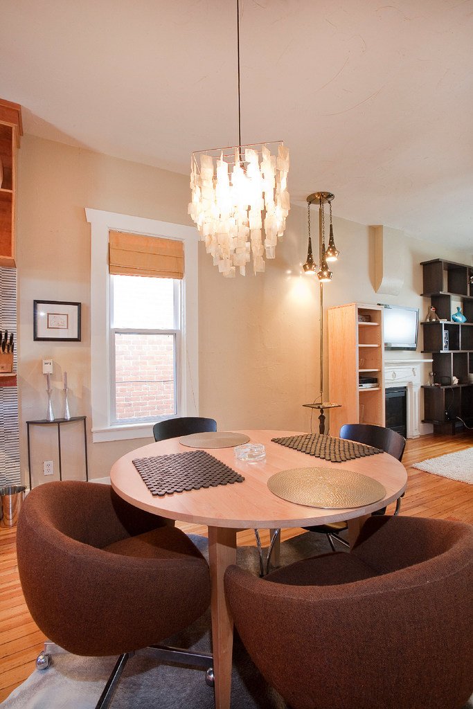 pearl disc chandelier over kitchen table