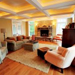 Living Room Lighting Ideas A living room with lights embedded in the crown molding across the ceiling