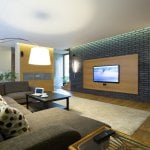 Living Room Lighting Ideas Brick wall in modern spacious drawing room