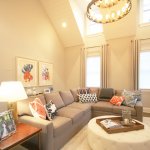 Living Room Lighting Ideas A vaulted ceiling with wainscoting makes a room feel much larger.