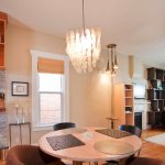 pearl disc chandelier over kitchen table