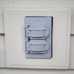 outdoor electrical outlet with gray outlet safety cover (Photo by Eldon Lindsay)