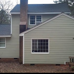 How Much Does It Cost To Install Vinyl Siding Angie S List The Back Of A House With Fiber Cement Siding