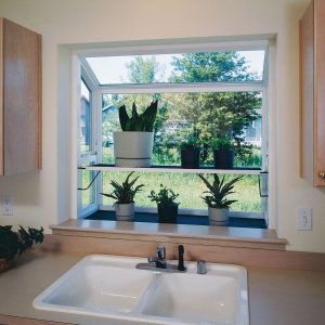 Kitchen Windows Make Your Remodel Shine Angie S List Garden Window Plants In Kitchen