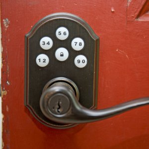 Red door with keyless lock in the handle.