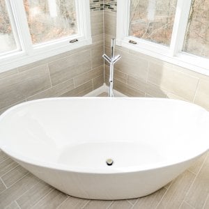 Should You Choose Bathtub Refinishing Or A Liner Angie S List White Ceramic Bathtub In Corner Of Bathroom With Windows Above
