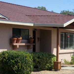 How To Pick The Best Roof Color For Your Home Angie S List One Story House With New Red Roofing Shingles