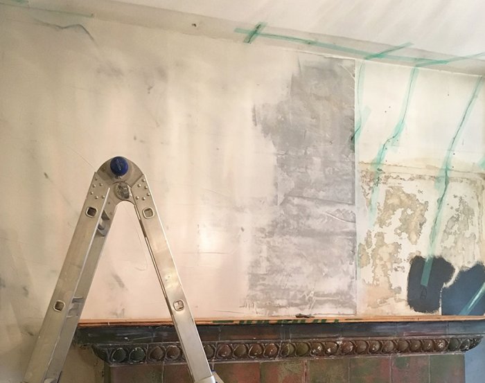 painted tile fireplace before photo