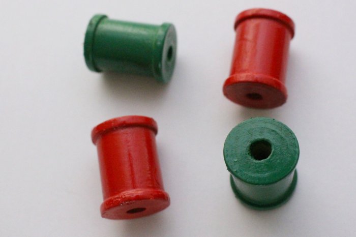 Green and red painted spools