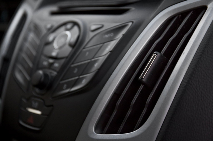 Picture of a car's A/C vents.