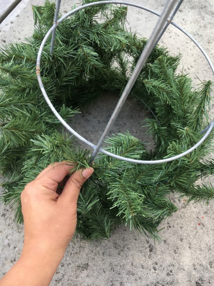 Wire garland will make sure it stays in place, but zip ties can add extra security. (Photo by Melissa Riker/The Happier Homemaker)