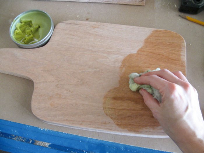 applying board oil to DIY cutting board