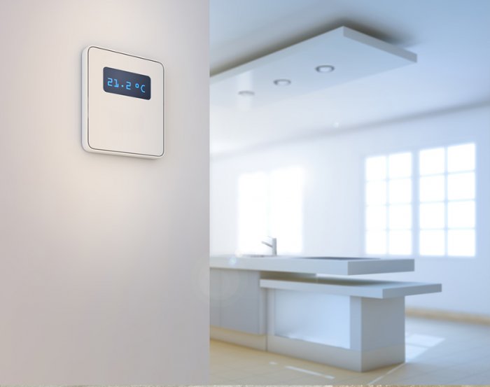 programmable thermostat on white wall