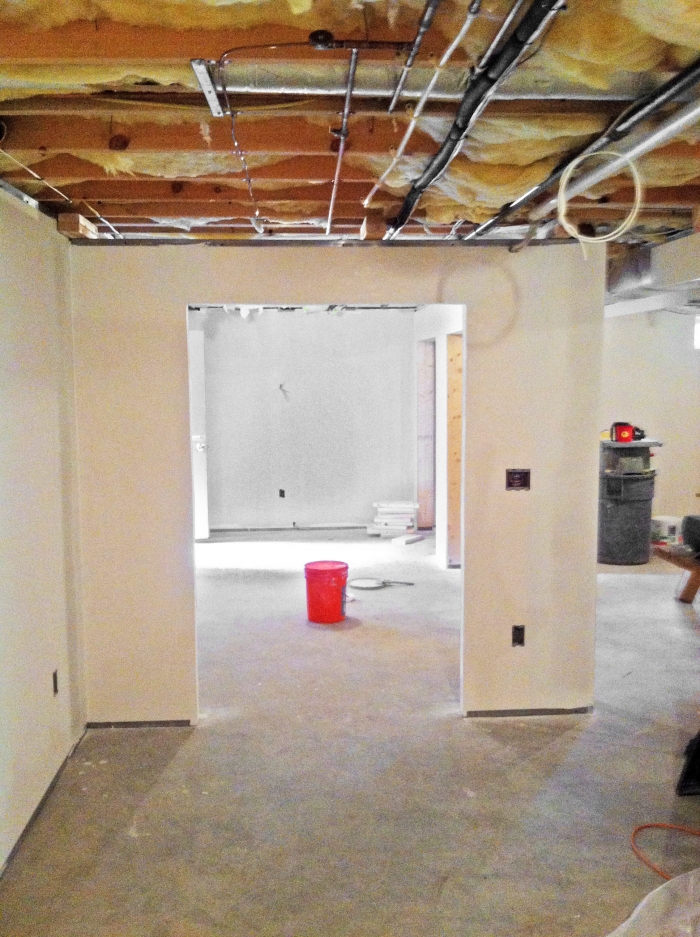 Before and after basement remodel