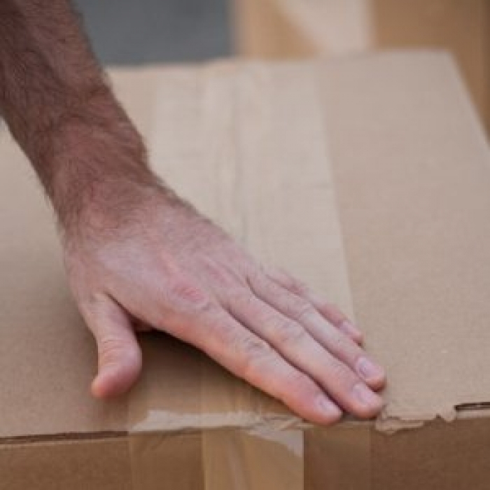 taping up a moving box