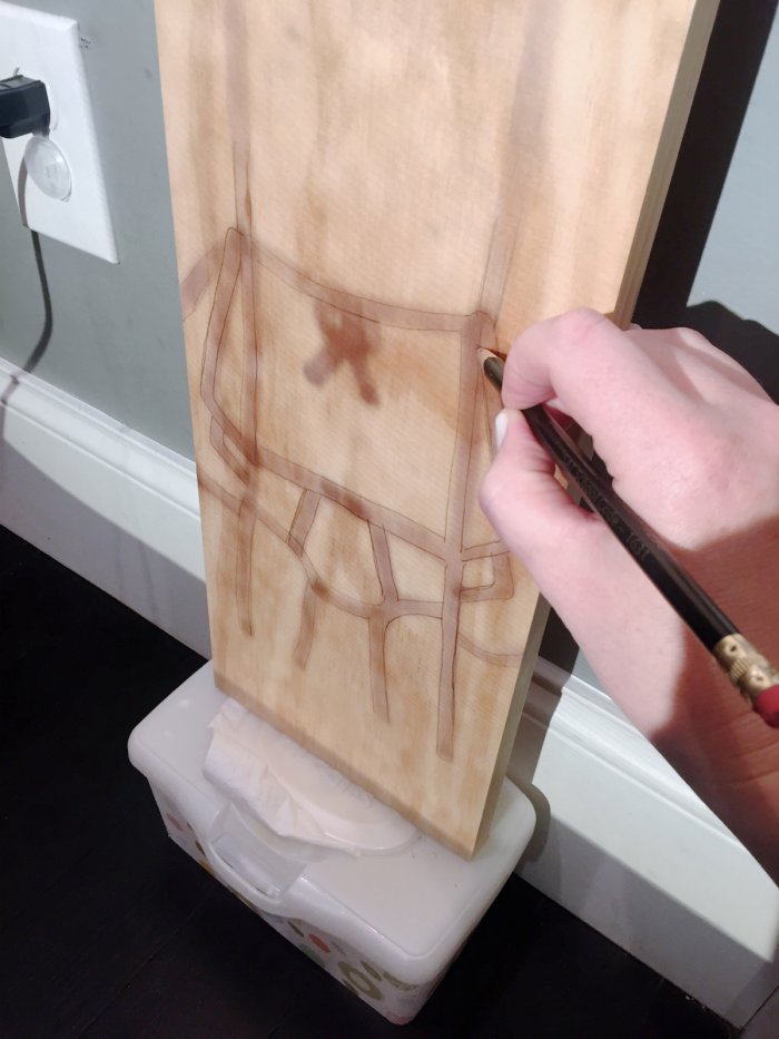 design projected onto pine board