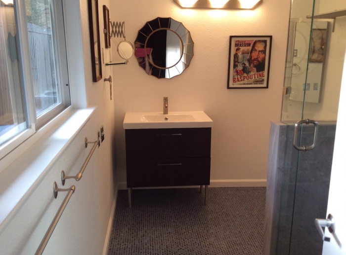 remodeled bathroom with sink and shower