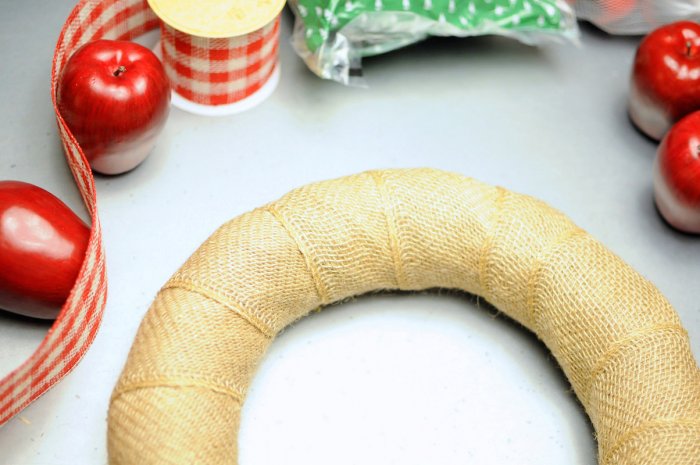 wrapping wreath form in burlap