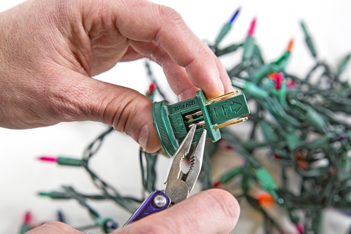 How To Fix Christmas Lights Angie's List replacing a fuse in Christmas lights - How To Fix Christmas Lights Angie's List