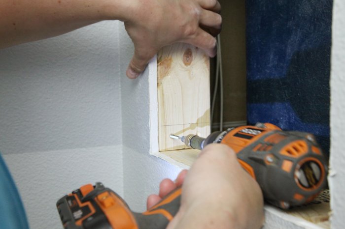 Extend your frame to hold the medicine cabinet. (Photo courtesy of Jennifer Jones/iHeart Organizing)