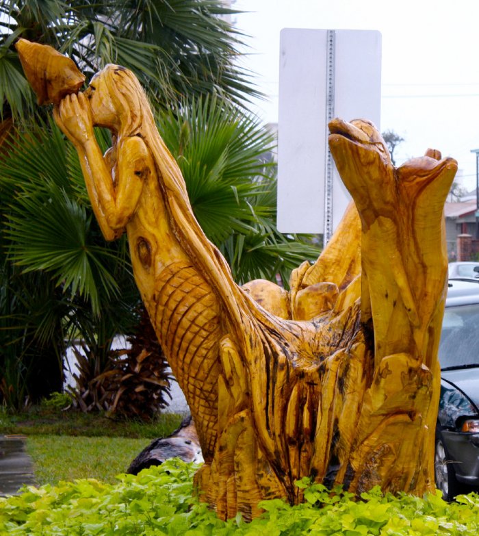 Tree stump mermaid artwork