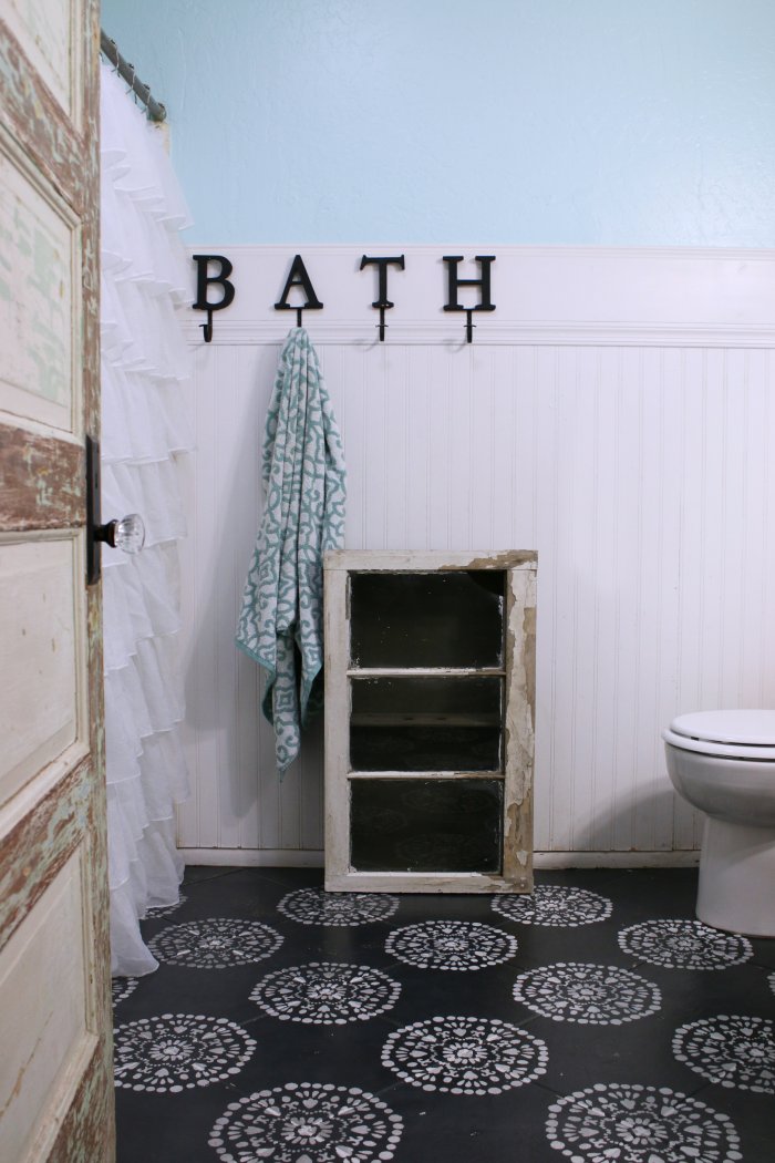 A bathroom cabinet is the perfect addition to a farmhouse bathroom. (Photo courtesy of Lolly Jane)