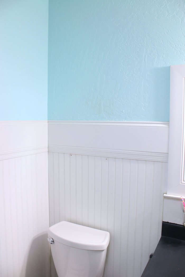 Install a cabinet on a blank stretch of wall. (Photo courtesy of Lolly Jane)