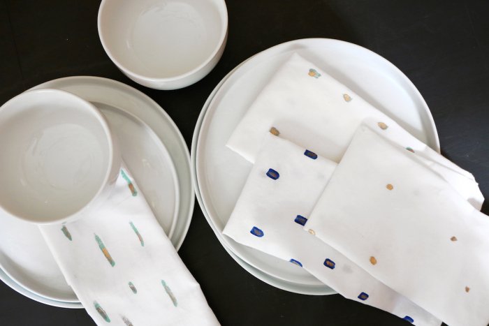 painted cloth napkins at place settings on table