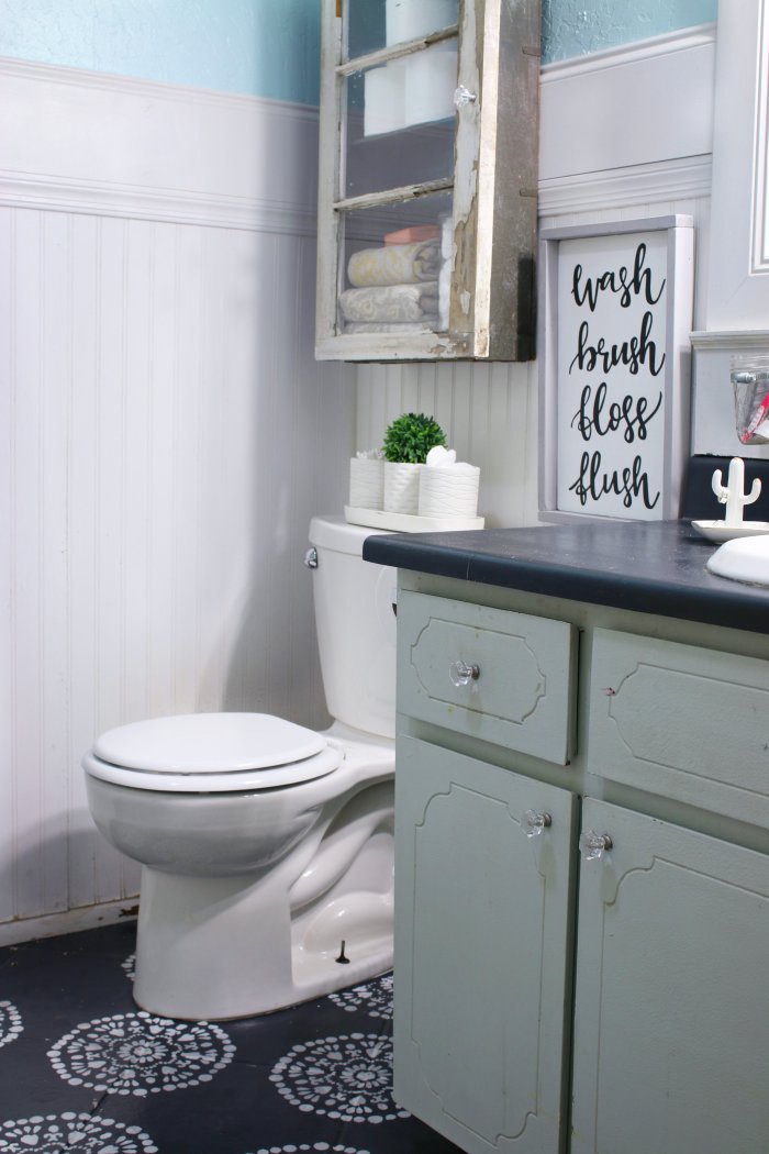 Match the details in the cabinet to your bathroom vanity. (Photo courtesy of Lolly Jane)