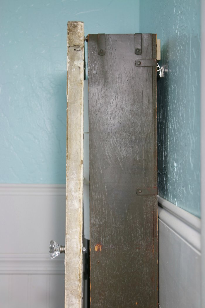 Add a wood backing so the wall-mounted cabinet sits flush. (Photo courtesy of Lolly Jane)