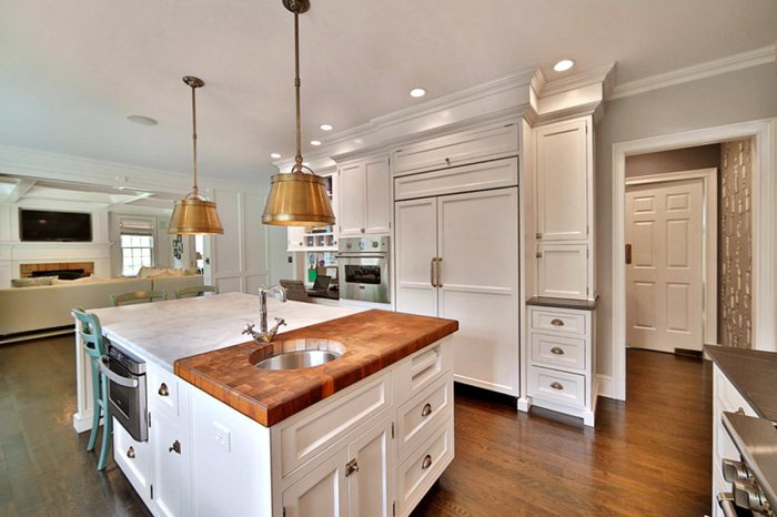 kitchen island with butcher block and marble