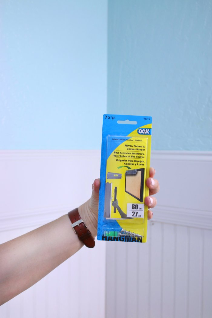 Use an OOK hanger for your cabinet. (Photo courtesy of Lolly Jane)