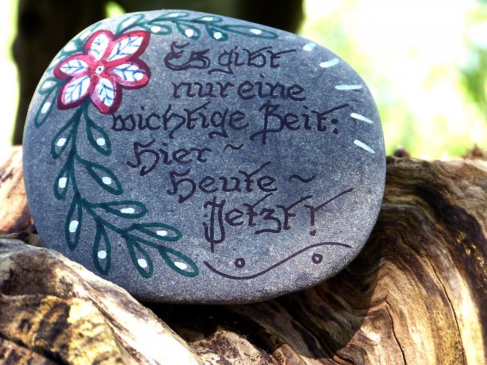 Paint stepping stones by yourself or with children for a fun, whimsical look. (Photo courtesy of Pixabay)