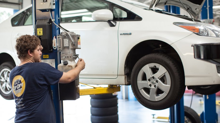 Car on lift in auto shop