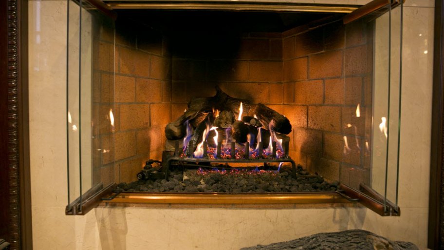 Fireplace with open glass door