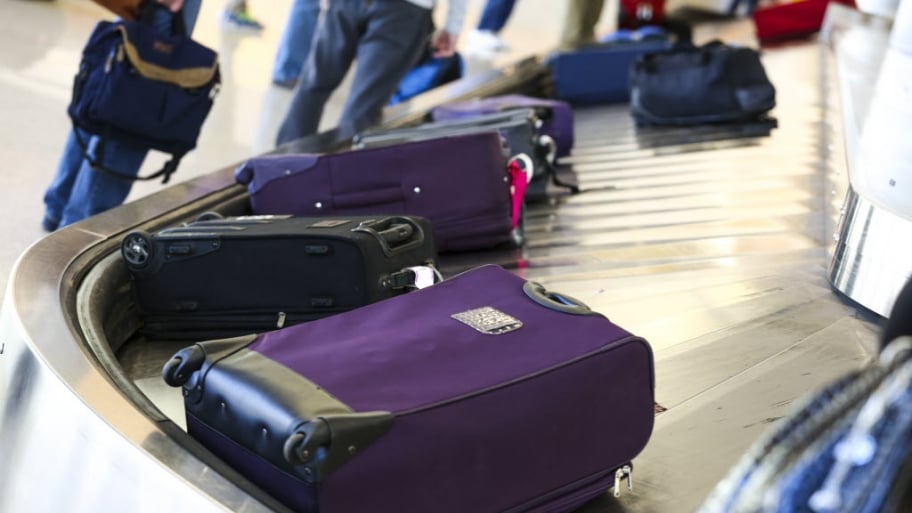 suitcases on an airport luggage carousel